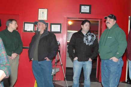 Artists andphotographers chat before the show