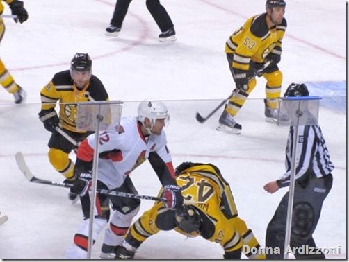 Fighting for the puck