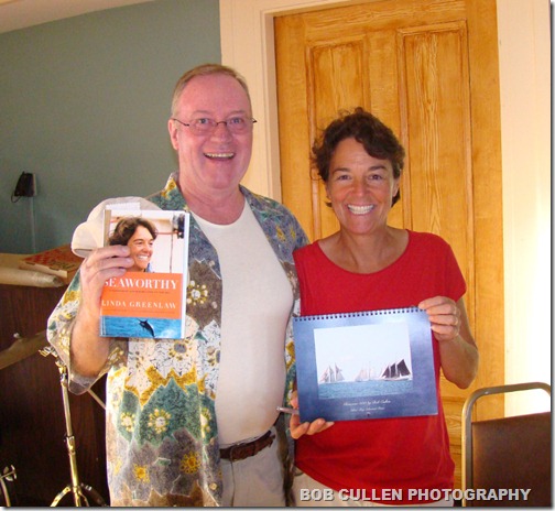 Bob with Linda Greenlaw's new book, and Linda with Bob's new 2011 Gloucester calendar.