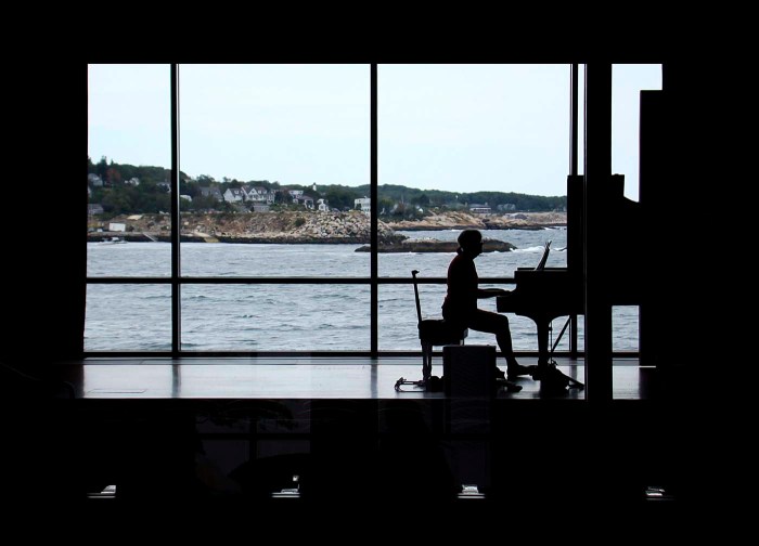 Pianist practicing one early Sunday morning at Shalin Liu Performance Center