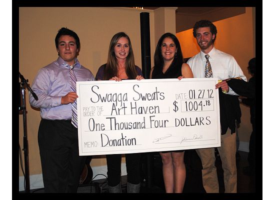 Swagga Sweats presents their donation to Art haven at the Buoy Auction