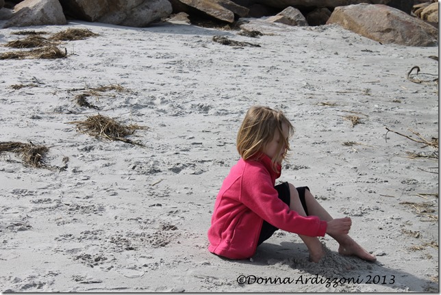 Maddie playing in the sand