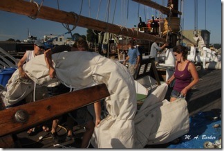 Amistad crew move the foresail
