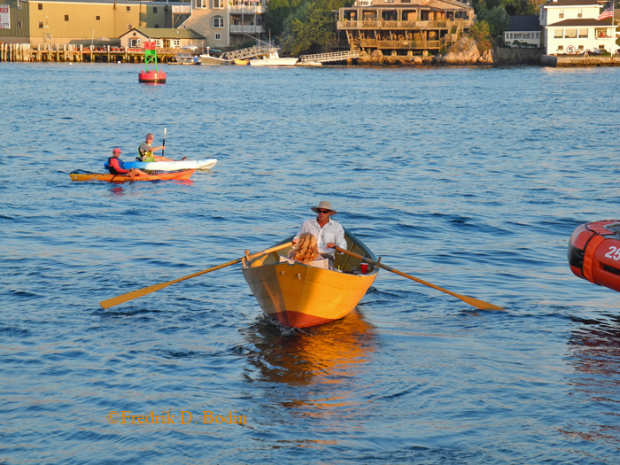 Jimmy T. and his wife Laurel row the dory back home to the Fort.