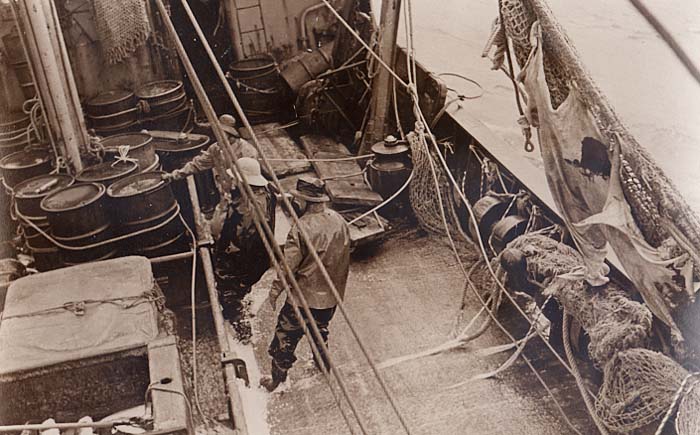 The decks are cleared, the checker boards put aside, and the barrels are lashed down. Heading home in some heavy seas. Photos by James H. Goodwin.