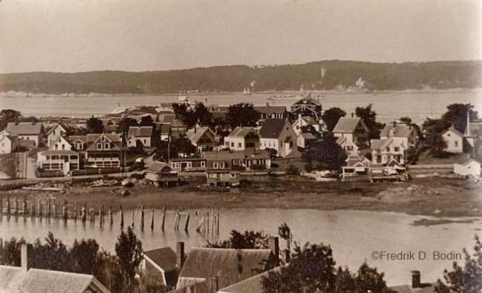 Rocky Neck, 1923. The occasion was Gloucester's 300th anniversary (1623-1923). It was a great celebration, attended by the US Navy. That's either a battleship or a heavy cruiser. In the foreground is the East Gloucester shore, Smith Cove and Rocky Neck. The pilings are the remnants of the old ferry service, that went around the harbor.