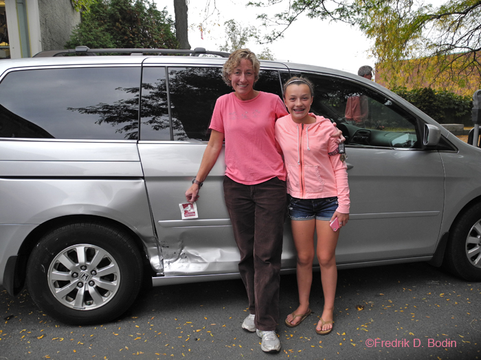 Here's the owner of the Honda that was hit, Robin Vaneck with her daughter Sophia. She just had her hair done at the West End Salon by Diane, who has cut my hair for the past 20+ years. What was amazing about Robin is that she wasn't bummed about the unfortunate accident. She smiled and had a positive attitude the entire time. Look at the photo: Daughter like mother? I'd say so.