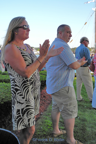 Here is Gloucester Police Chief Len Camponello at the Mayor's Reception for the Schooner Races. Knowing him just enough to say "Hi," I walked up to him and re-introduced myself. "Your out of uniform," I said. He chuckled and replied: "Yeah, I know." But I noticed his eyes were continually scanning left to right, and right to left. "Are you working?" I asked. His reply: "I'm always working." You gotta like a Police Chief who can attend an event in cargo shorts, untucked sports shirt and moccasins, with no socks. Was he really working? I wouldn't contest that. A real professional with a community style. I've never seen or heard of a Police Chief who is totally  there for the community, and has inspired his department. He posts on GMG, our community blog. There's a GPD Facebook Page. The GDT loves him. I'm very impressed and we're extremely lucky to have him. Oh, he looks great in uniform too! See http://www.gloucestertimes.com/local/x934954145/Busy-year-at-the-helm, https://www.facebook.com/GloucesterPoliceDepartment, and his post on GMG https://goodmorninggloucester.wordpress.com/2013/09/30/city-of-gloucester-police-chief-len-campanello-reflects-on-his-first-year-and-looks-forward-to-the-next-with-the-good-morning-gloucester-readership/ What's next Chirf Len...Twitter? Probably already there!