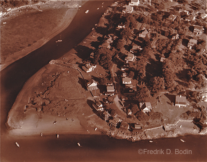 This is a great example of a "point." I used to do a lot of photos for geography texts, and this is a good example. Twenty years ago, a friend, who sold me my first Kayak, asked me over to look at his darkroom equipment. I went, and didn't need anything. "Do you have any negatives," I asked. So I ended up with 1,000 aerials taken from Boston to Boothbay, ME. Photo by Don Felt. Where is this location?