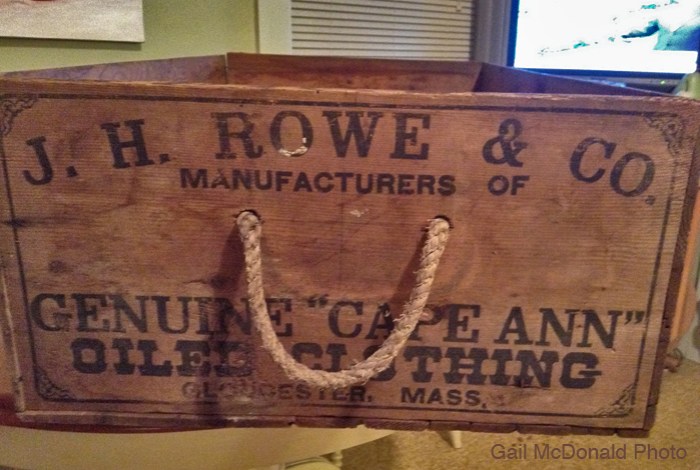 My friend Gail McDonald would like to know more about this wooden box she acquired. It's a beautiful box. This is what I know: Joseph H. Rowe founded his oiled clothing company in 1884 in Gloucester. He improved apparel technology to be waterproof, especially useful for fishermen. His "Mother Ann" brand manufactured coats, pants, Sou'westers (hats), boots, horse covers, and wagon covers. We have a Rowe's Wharf, where Cruiseport is now. Any additional information will be appreciated.