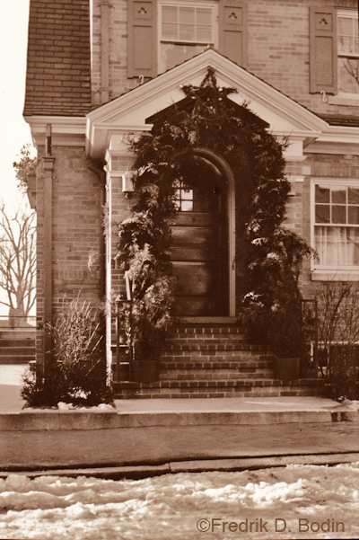 Willard Pike's Christmas doorway, 1935. This photo was taken on Pine Street. Pike's funeral home is now the Pike-Grondin Funeral Home at 61 Middle Street. There's a little snow, like we have now.