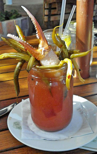The Christmas holiday is  over. Thank heavens! I hosted so many holiday parties at the gallery this month that I'm totally tuckered out. Now it's time to look forward to 2014 and new adventures. This is an awesome looking Bloody Mary. It could be your dinner and your drink. I'll have mine without the green worms please!