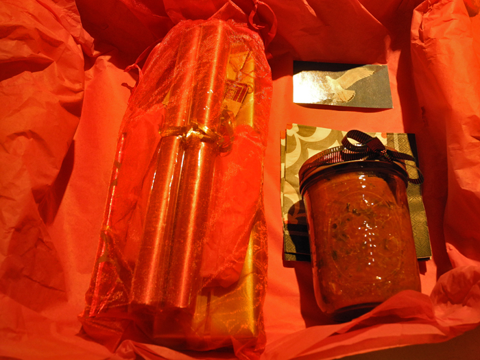 I haven't been in the gallery since New Year's Eve, and then came the holiday and the snow storm. There is no parking on Main Street until 8am Saturday. I came in today (Friday) to turn the heat up, because of extremely low temperatures tonight. Jaime from Jalapenos came in with a present for Janet and I, which was left in the entryway by Peggy, owner of the POP Gallery. It contains a jar of homemade meat sauce and I don't know what in the other wrapping. She had left a bottle of wine, but thought it might disappear. Her note said: "here is your New Year's Eve Dinner. Such Kindness! 