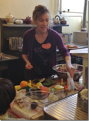Vegan chef Elizabeth Reed demonstrates a recipe at the Gloucester Unitarian Universalist Church.