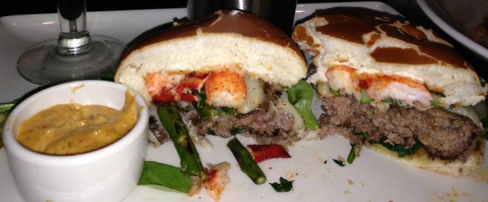 maine lobster sautéed in garlic butter, grilled asparagus, swiss and tomato béarnaise with fries