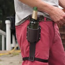 Red Envelope Leather Beer Holster.  You can even get it monogrammed so it doesn't get mixed up with your neighbor's beer holster!