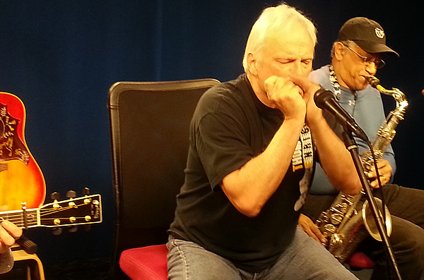 Parker Wheeler (on harmonica) with Amadee Castenell on Sax.  Guess who's on guitar?