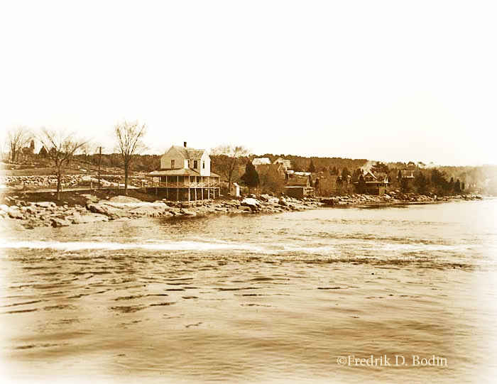 In this photo, the tide is coming into Goose Cove, taken 100 years ago this month. Most of the houses on the shore are still there. Photographer Alice M. Curtis's caption says it's "taken from the bridge." She used a tripod to steady her camera, and made a 5x7 inch negative. 