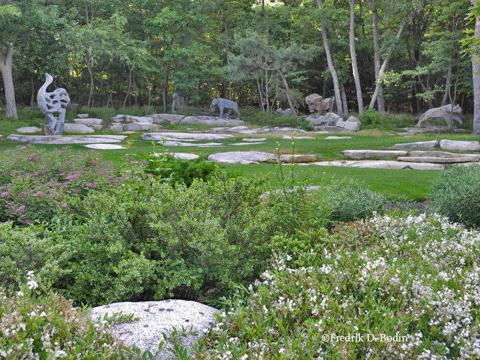 Last fall, Janet and I found a small private park populated by amazing African animal sculptures. I loved that place. Over months of hospitalization recovering from cancer related disabilities, I often thought of seeing "my" special animals again. Today I did, and on foot – I walked 1/2 mile up Phillips Avenue and home again using my rollator (a hybrid walker with four wheels http://whatisarollator.com/) under the watchful eyes of Janet. Not much of a hike for most people, but a milestone for me. I rested for a moment while removing my camera from the bag under the rollator seat and to shoot this photo. Events similar to this happen often, and the satisfaction they impart encourage one to continue down the path to better health.