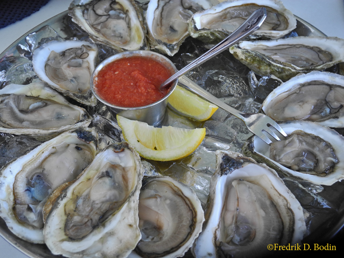 A few weeks ago my sister (Painter Barb) and her husband Robert visited us in Rockport. We discovered that our neighbor, the Emerson Inn by the Sea, was open for lunch in the summer. The convenience was only equalled by the tasty food. We marked the occasion by eating a platter of Darmariscotta oysters, seafood luncheon entries, and a good sit on the open porch. http://www.emersoninnbythesea.com/amenities.htm