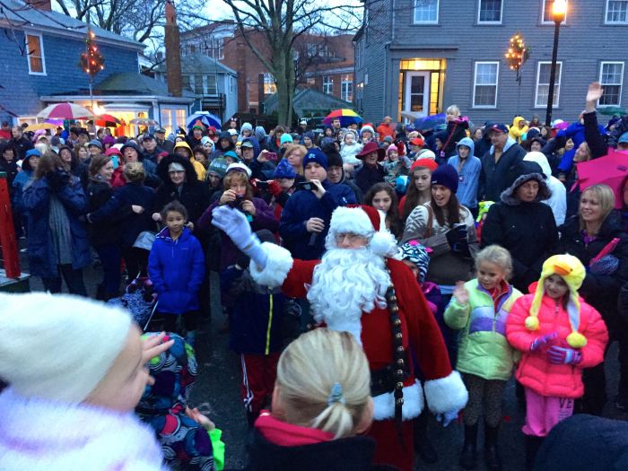 This crowd just a small fraction of the thousands who braved the weather to greet Santa Claus.