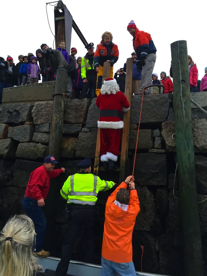 Look at that! Elfen pixie dust or something and she magically appears on the top of the ladder to help Santa.