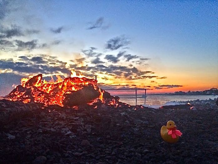 Before you know it the planet wobbles the other way and it is 4th of July in Rockport and Rubber Duck is getting soft in the heat from the leftover bonfire.