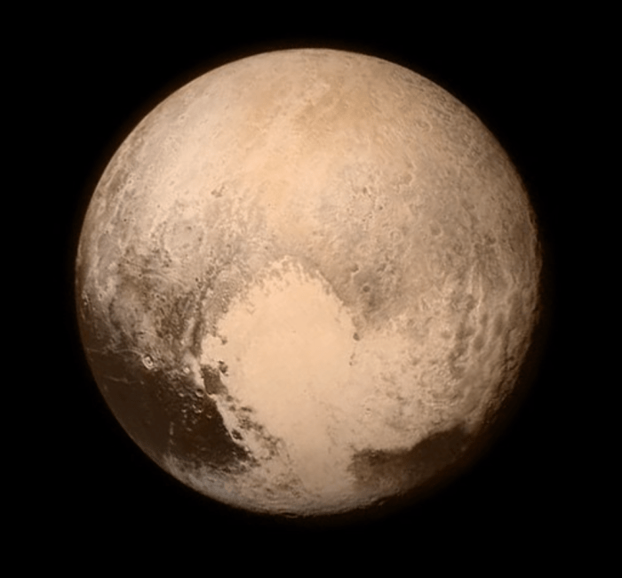 Isn't this cute! Aliens have drawn a cute heart on the side of Pluto! This view was from last night as the New Horizons NASA probe approaches the last planet to be photographed up close and personal.