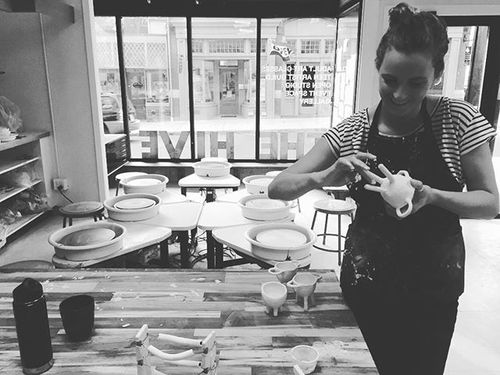 @simonebodmerturner glazing her footed planters for the kiln. #ceramics #gloucesterma
