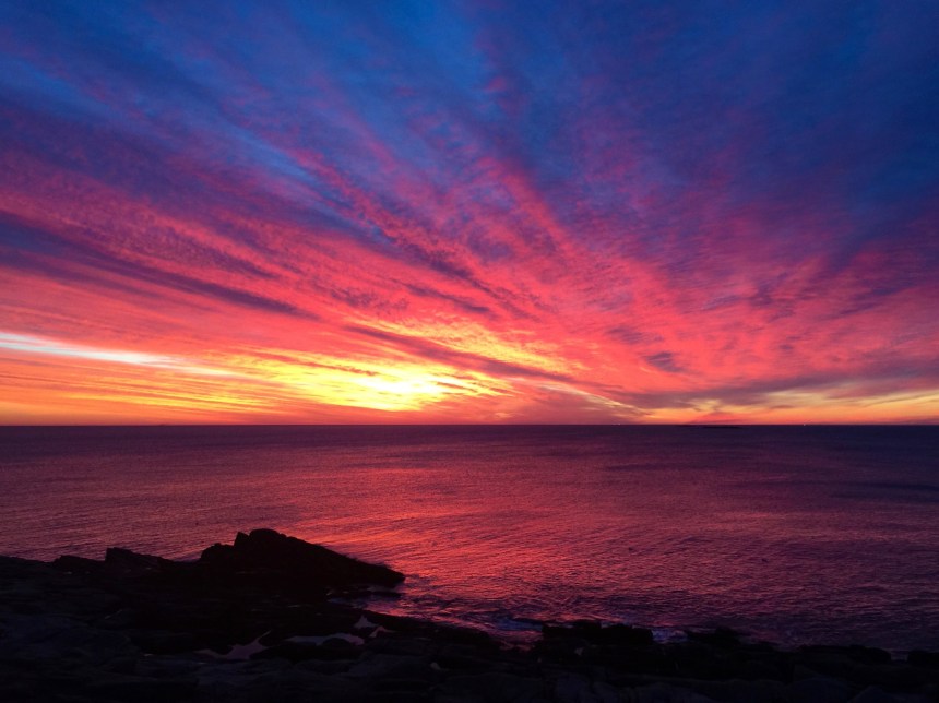 At 6:41 AM this morning, 16 minutes before sunrise the Rockport Breakwater was on fire. My little iPhone hardly captures  the conflagration.