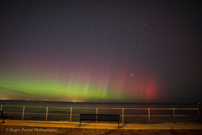 The stubby white line is an airplane caught in the short exposure.