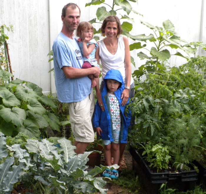 Peggy and her family in their garden.JPG