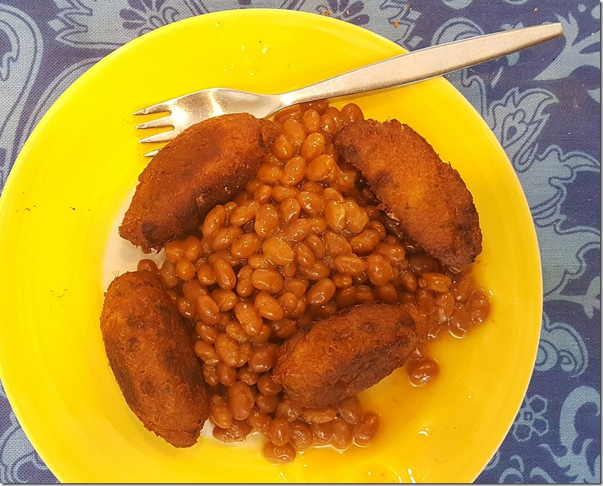 Pasteis de bacalhau with baked beans