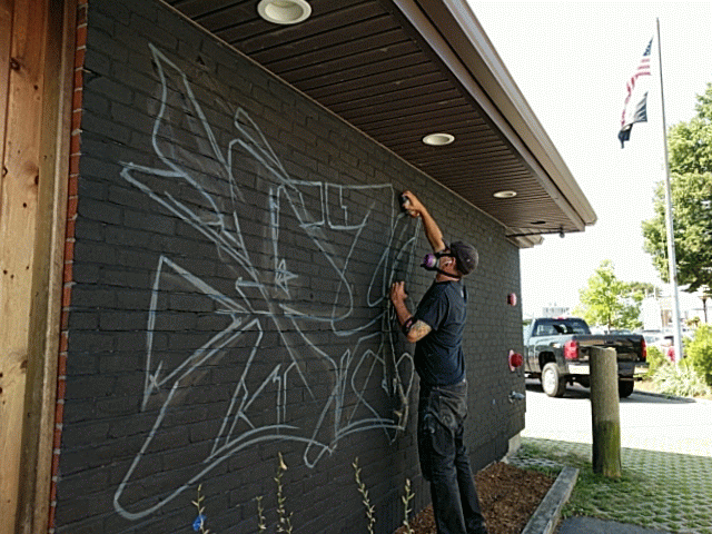 Danny Diamond in action mural Cape Ann Brewery