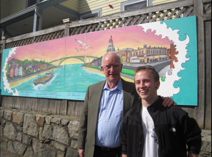 ©Terry Weber photograph,Nov 2010, unveiling mural at Action then Exec Dir Tim Riley on left, artist Cole Herbert right unveiling Harbor and Home mural