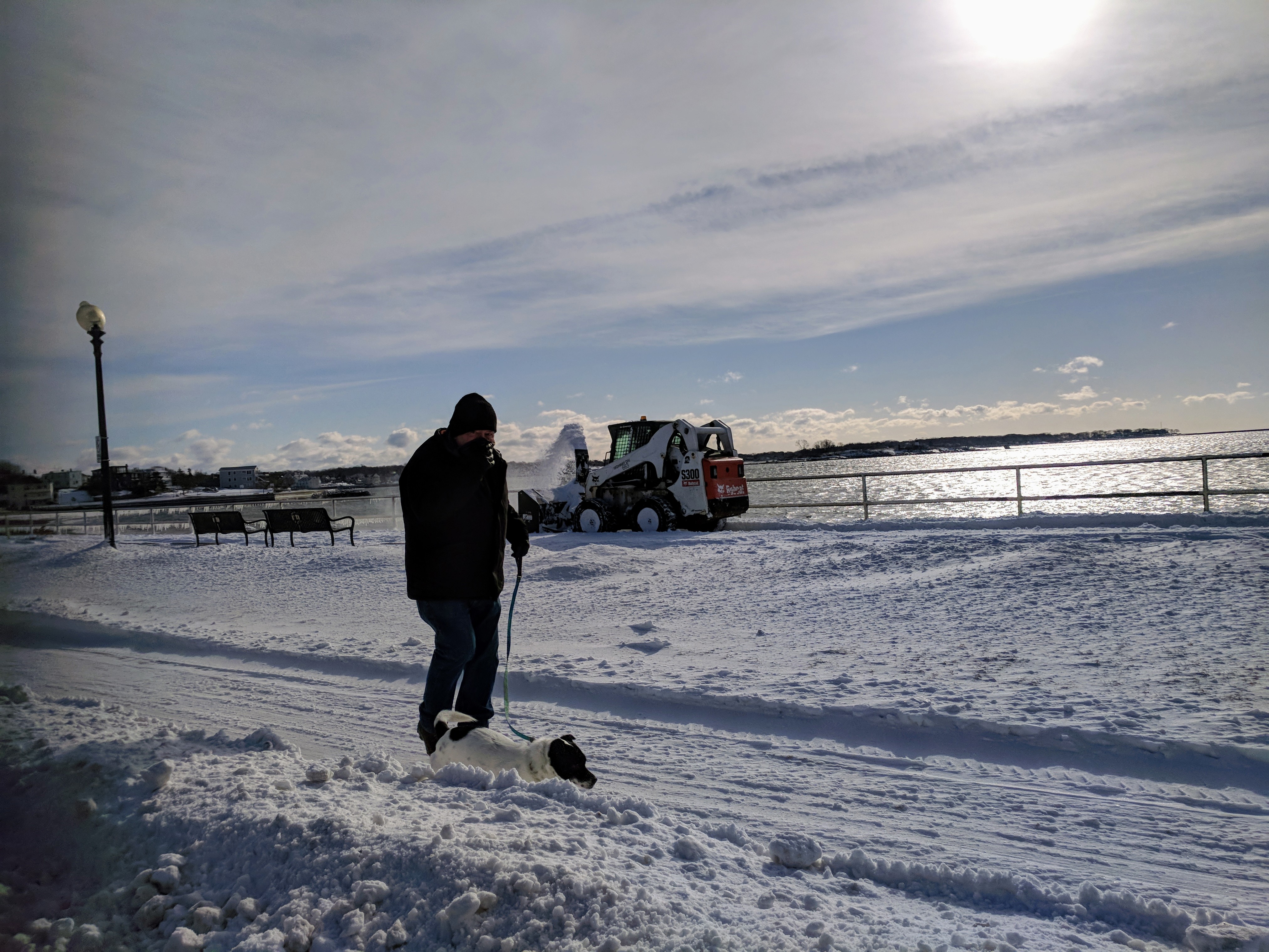 CLEAN UP AFTER STORM Stacy Boulevard sidewalk snow plow on ocean path-dogwalker out and about didnt miss a beat GLOUCESTER MA IMG_20180106_105912