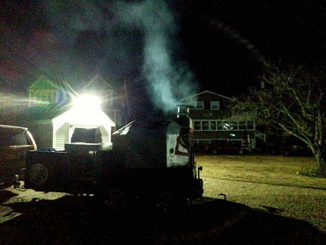 tailgating prep_gloucester patriots gourmet super fans grill brick oven stoking more than a day_6am 2019 january 13_ ©catherine ryan (1)