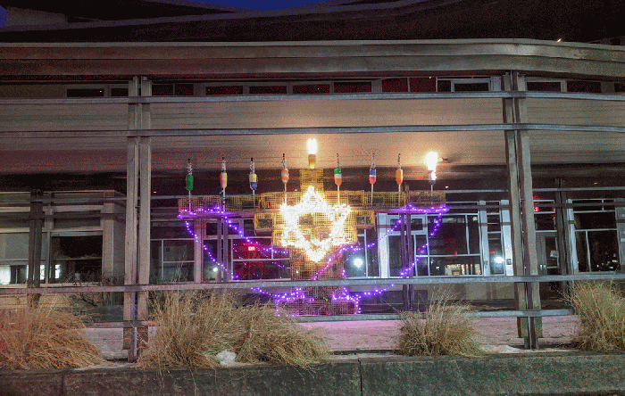 from Middle street_GIF lobster trap menorah lit eight nights_ December 2019_Temple Ahavat Achim_Gloucester, Mass._ photograph copyright © c ryan