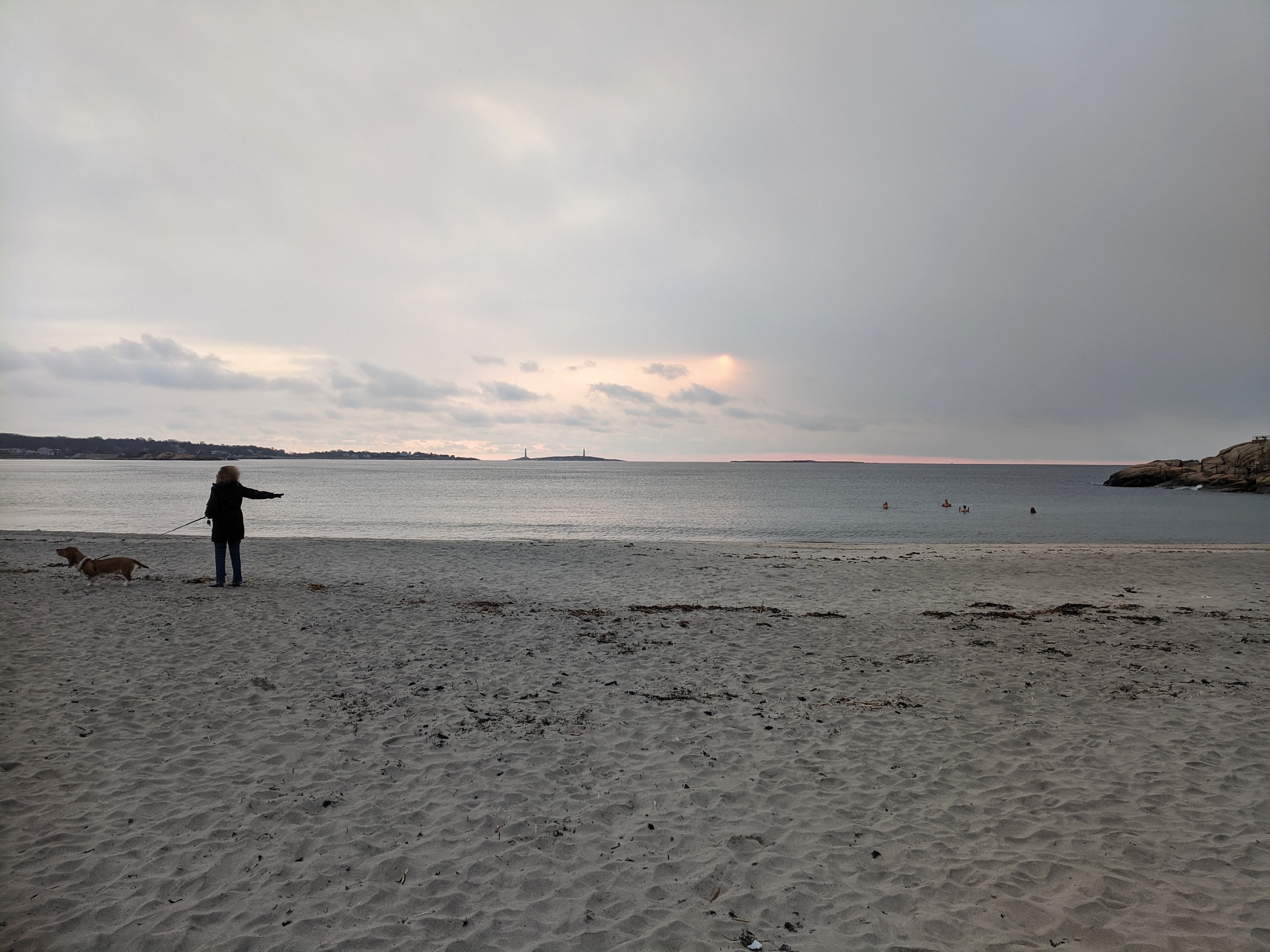 They stay in for 10 minutes_sunrise swimming and snowing April 16 2020_Long Beach Gloucester side ©c ryan