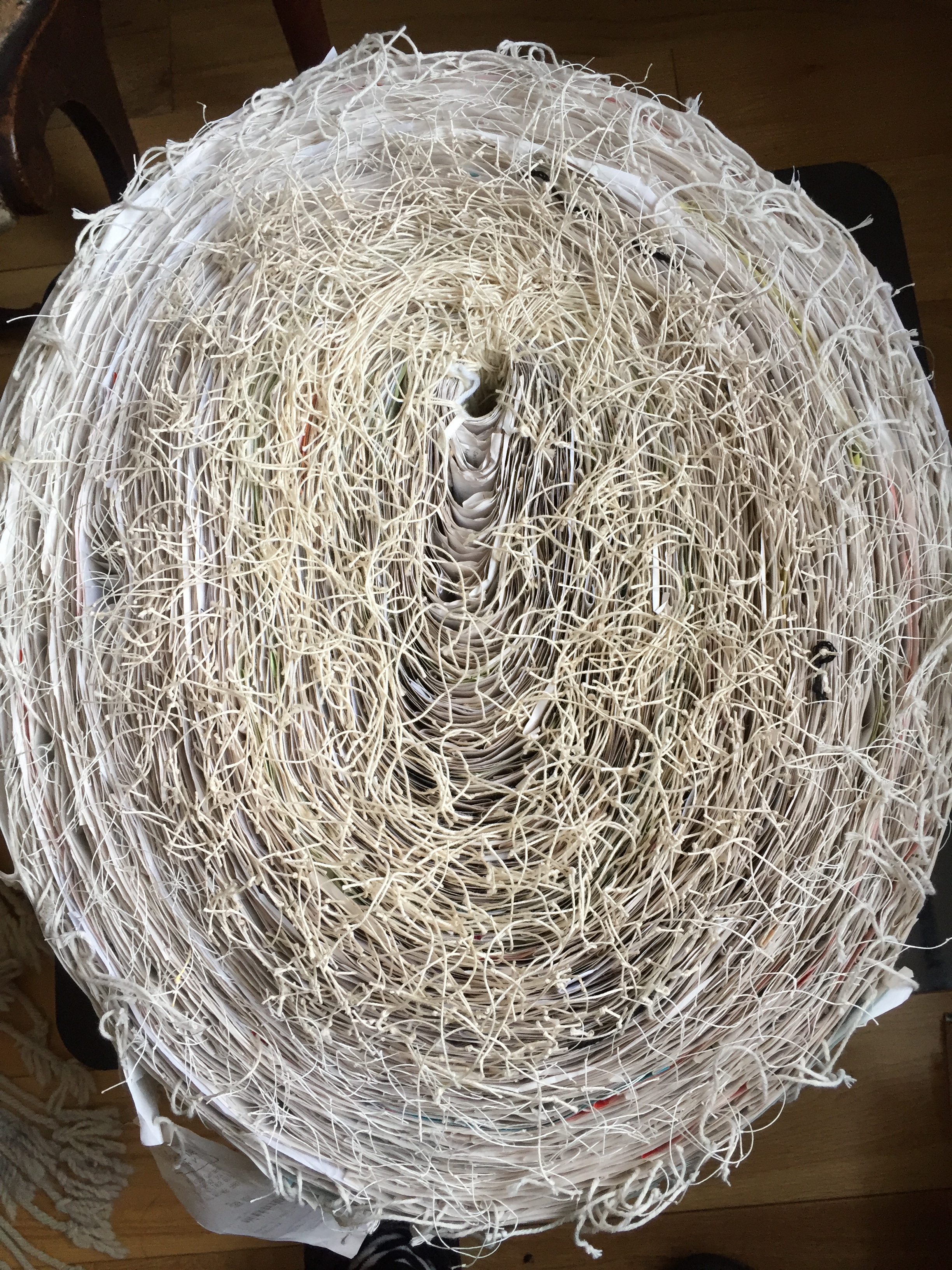 GAIL BARKER Untitled 2018 paper receipts, linen thread. 10x10x3 in at Jane Deering Gallery 2020