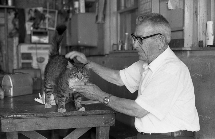 man with cat and lunch box.JPG