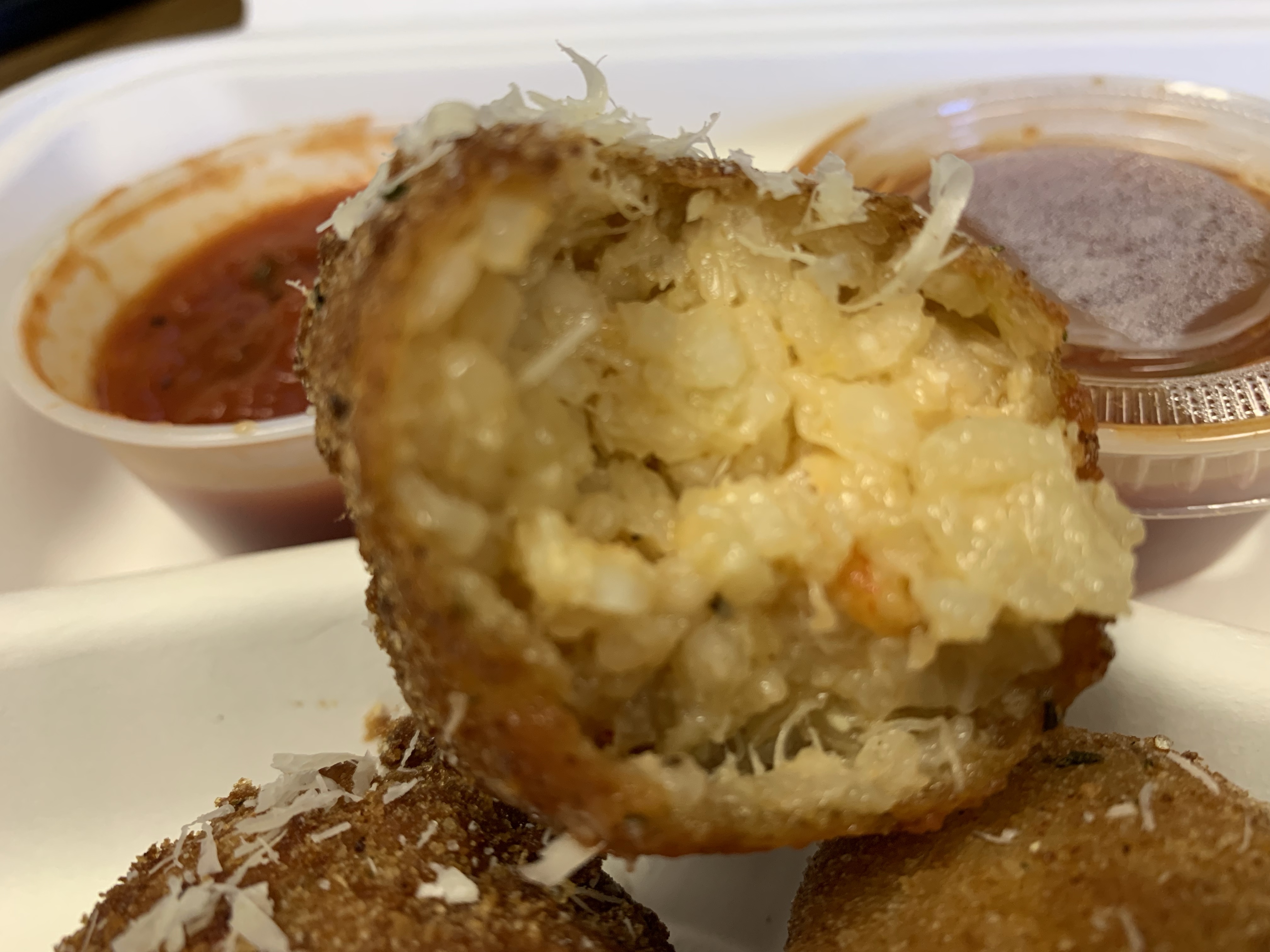 Alex Hill’s Lobster Risotto Arancini Served at The Beach Pit at Bass